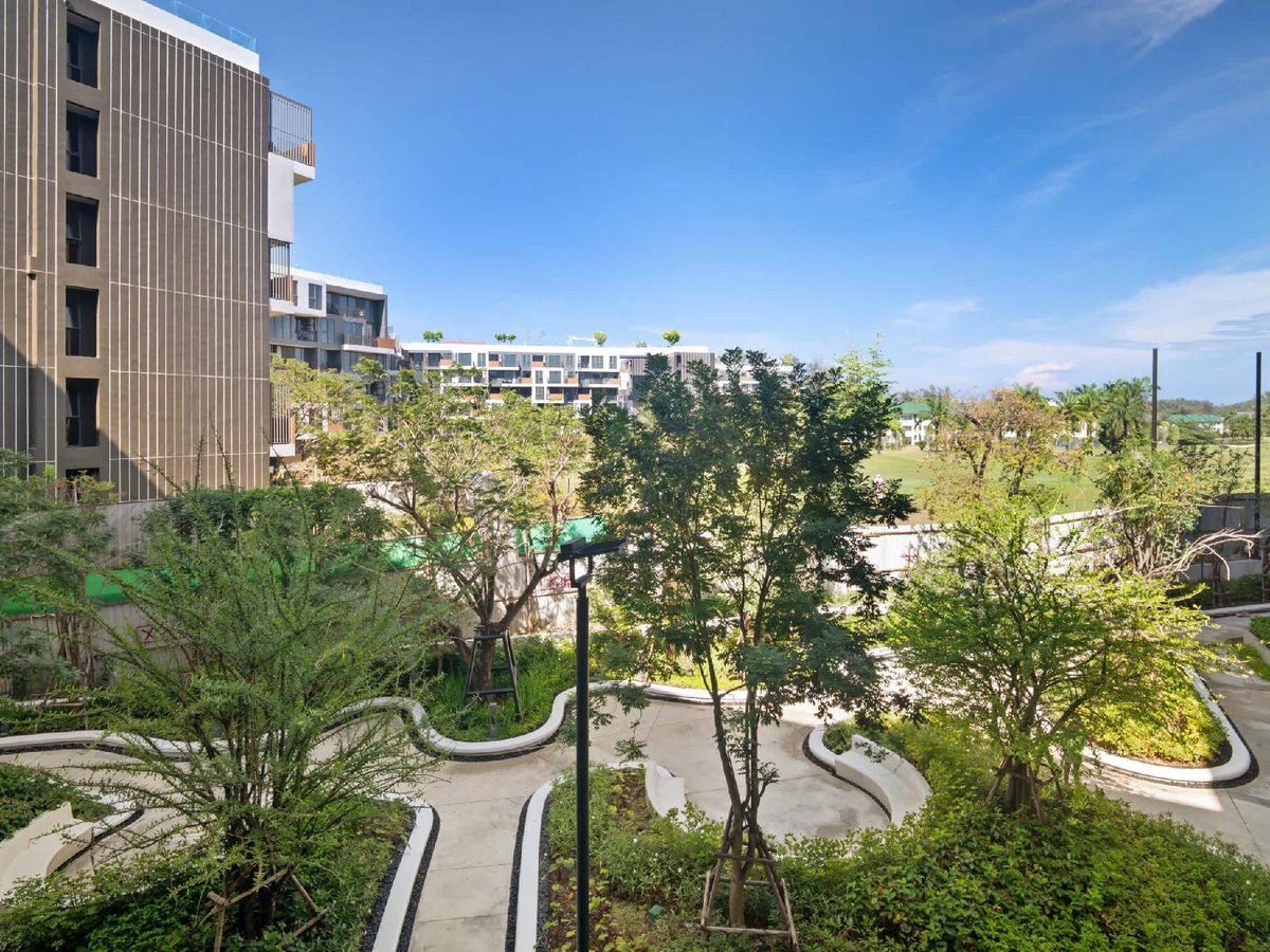 Skypark Celeste — landscaped walkway between buildings